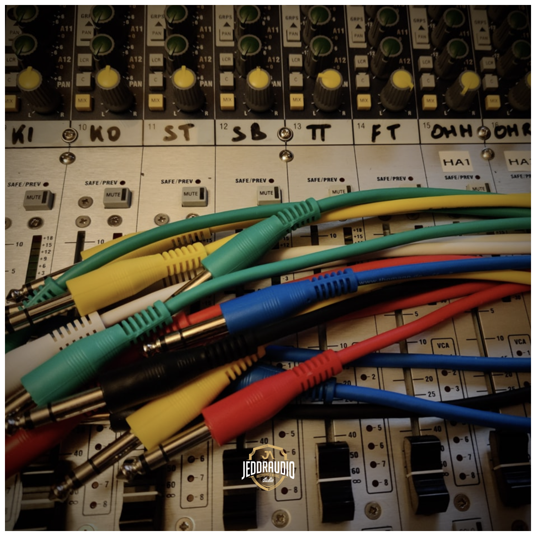 A recording console with patch cables